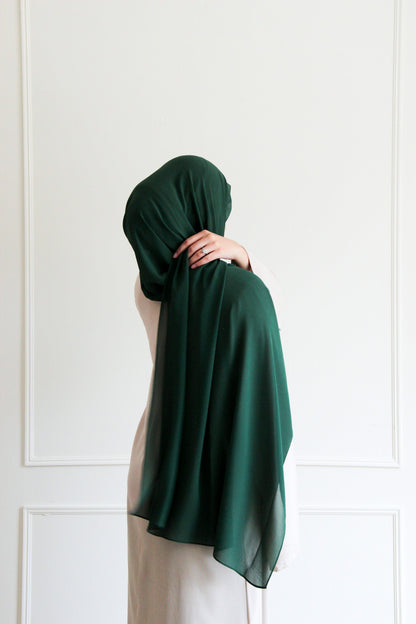 Premium chiffon hijab in Dark Green – deep forest hue with a lightweight, graceful drape perfect for a timeless, modest look