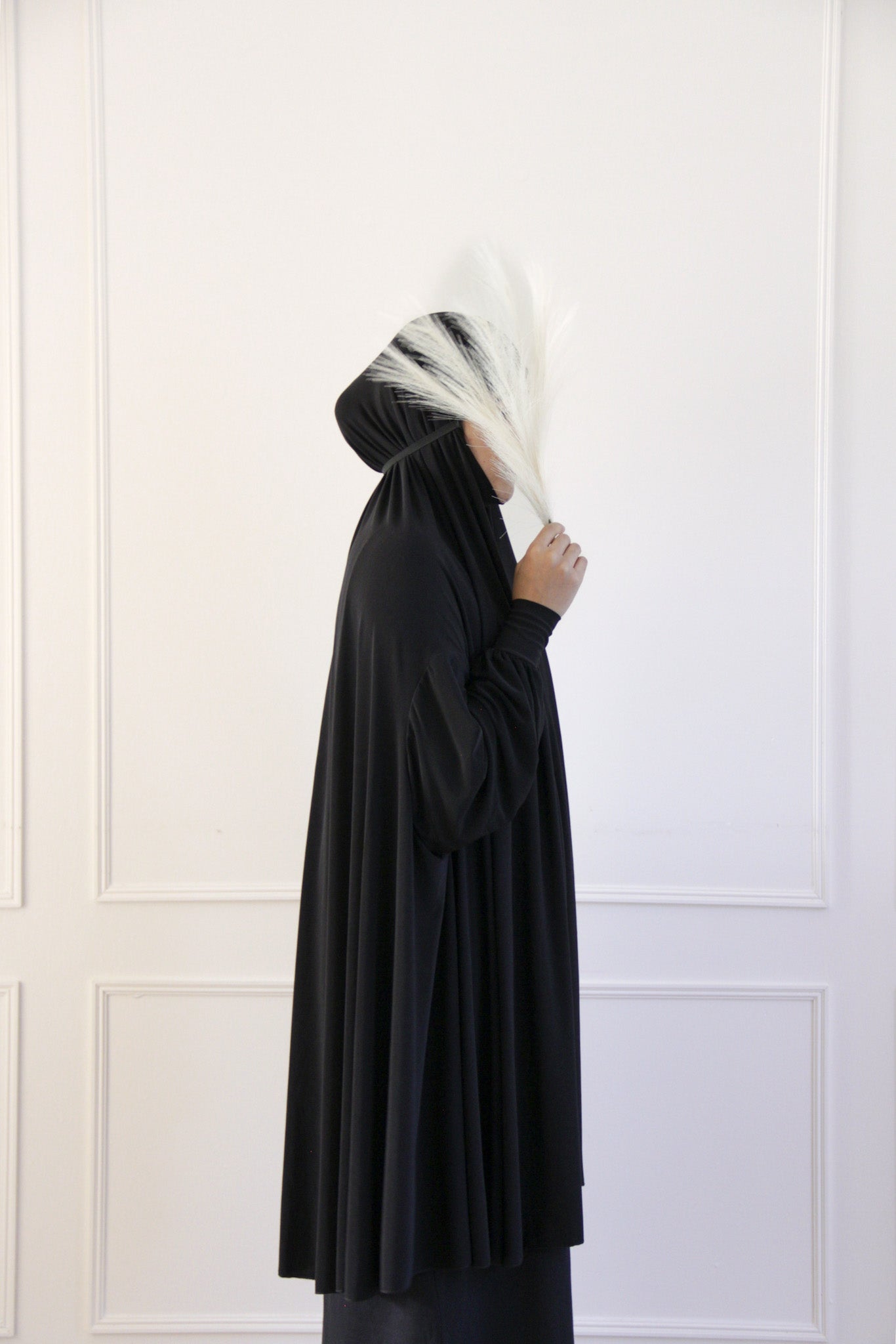 Premium black Lycra khimar prayer dress with full batwing sleeves and attached niqab